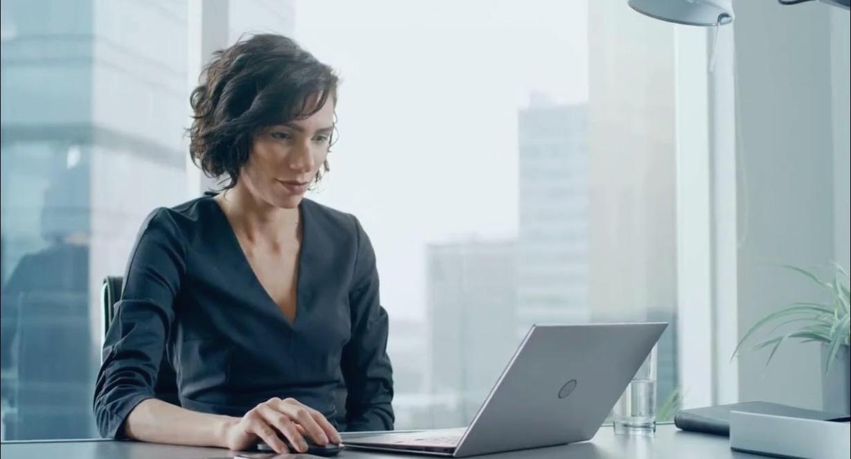Student working through financial planning exercises at a desk